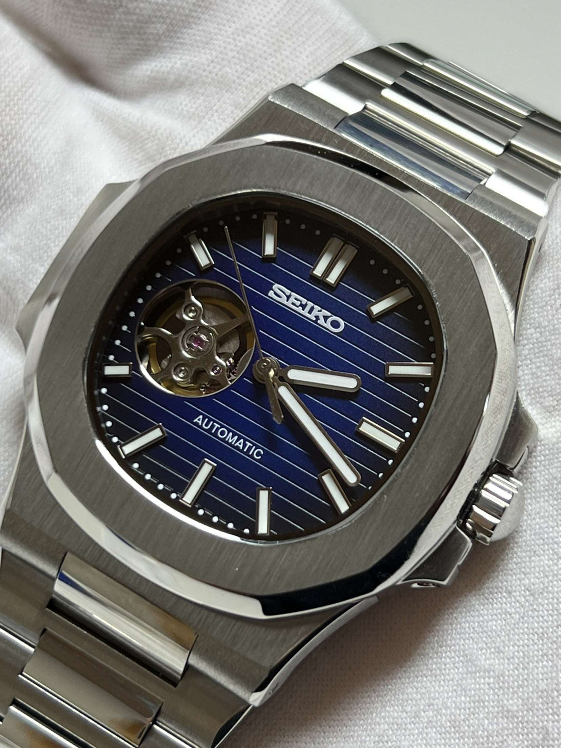 Seiko Mod Nautilus - Blue Open heart custom Seiko mod watch by Timelab Mods