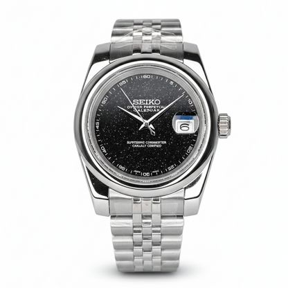 Seiko watch with black dial and silver metal strap on a white background